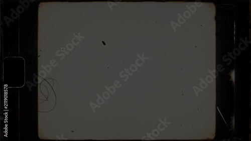 Old film frame overlay with scratches and dust. Perfect for retro video effects, nostalgic flashbacks, cinematic transitions, and adding an authentic old analog movie aesthetic to modern footage.