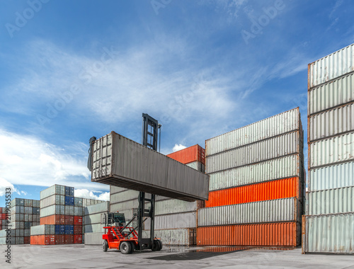 Containers are lifted by forklift into the port