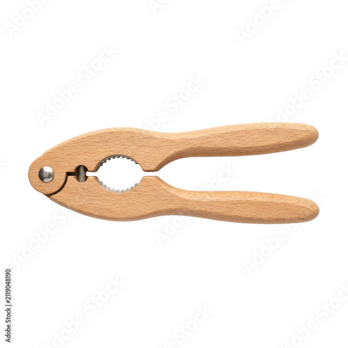 Traditional wooden nutcracker tool with metal hinge.