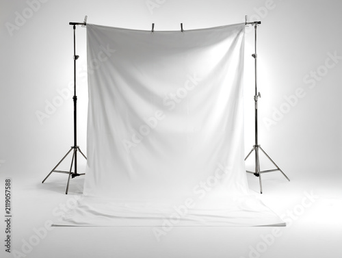 Studio backdrop stand isolated on a clean white background, featuring high-key lighting and a minimalist product photography aesthetic.