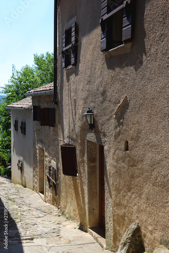 Fotografie Historical architecture and beautiful landscape in the picturesque Mediterranean street in Hum, Croatia