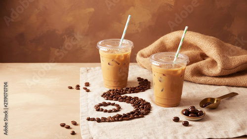 cup of coffee with cinnamon sticks and cinnamon