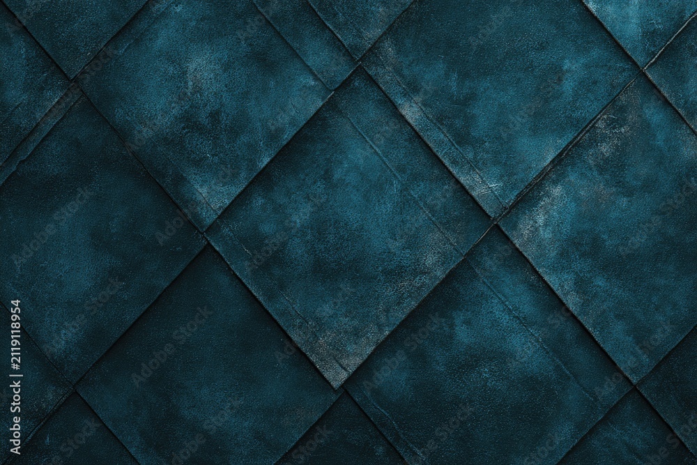 Obraz premium Close-up of a textured, diamond-patterned surface in varying shades of teal and blue