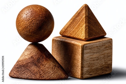 Wooden geometric solids arranged on a white background in a sharp macro photography shot for educational resources and architectural branding
