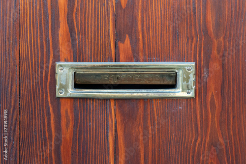 Quadro su tela ​Horizontal close up photo of a vintage brass mailbox mail slot with Italian wor