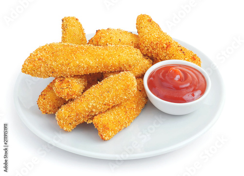 Foto Fish fingers sticks with ketchup isolated on white background.