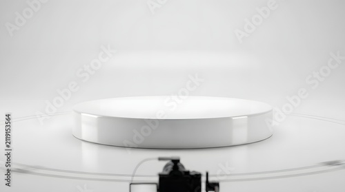 White cylindrical podium on transparent platform