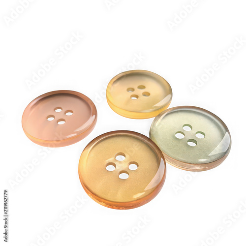 Five assorted shiny metal buttons in a row