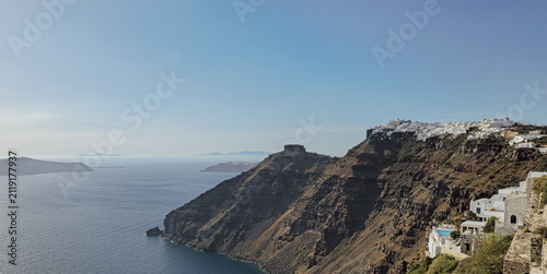 Obraz na płótnie Scenic view of Santorini volcanic caldera cliffs with Skaros rock and white vill