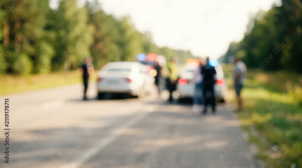 Fototapeta premium blurred police scene traffic stop emergency lights on highway road law enforcement vehicle background abstract safety security accident patrol