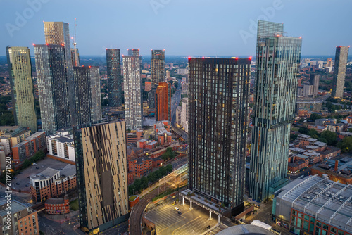 Fotografie Manchester Skyscraper District and Modern Commercial Real Estate at Dawn