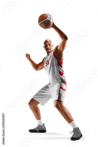 Professional basketball player in action. Isolated on white background. Sport emotion