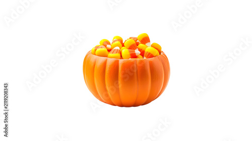 Pumpkin bucket overflowing with candy corn