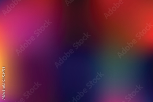 Abstract blurred background with vibrant gradient colors, smooth transition of purple, red, and blue light effects