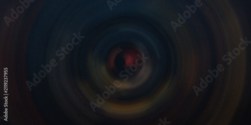Konstfotografi Abstract dark background with a central red nucleus surrounded by swirling radial blur effect