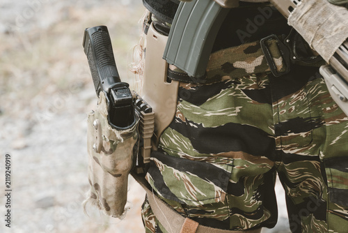 Tactical equipment concept. Military sidearm and combat loadout prepared for operational readiness in field mission, tactical, equipment, military, sidearm, readiness