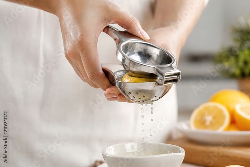 woman holding lemon