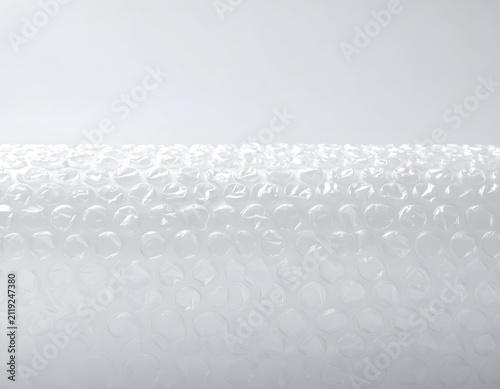 Close-up of clear bubble wrap packaging material with air filled plastic bubbles