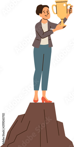 Businesswoman holding trophy on mountain peak