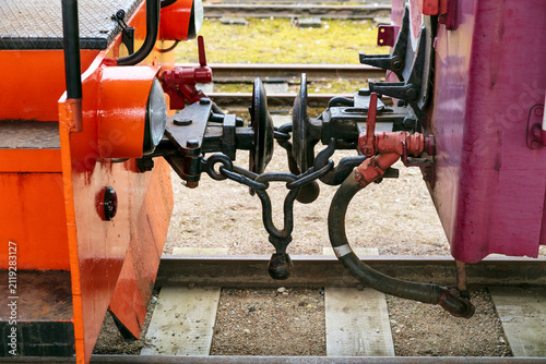 View of the coupling mechanism between two train cars of the Aukstaitija narrow gauge railway in Panevezys, Panevezio apskritis, Lithuania.