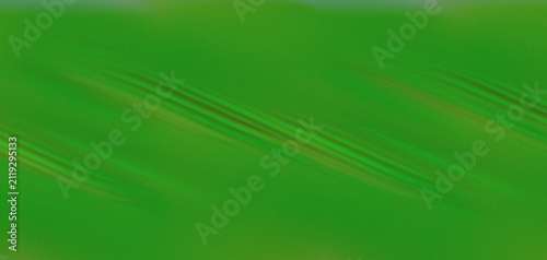 Foto Green field with subtle diagonal lines and abstract texture