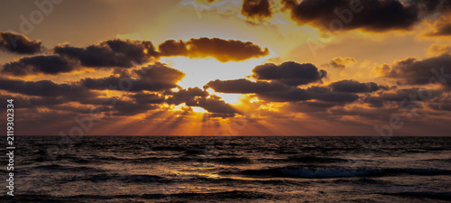 The extraordinary  beauty of the panoramic sunset over the Mediterranean Sea from the city of Ako in northern Israel
