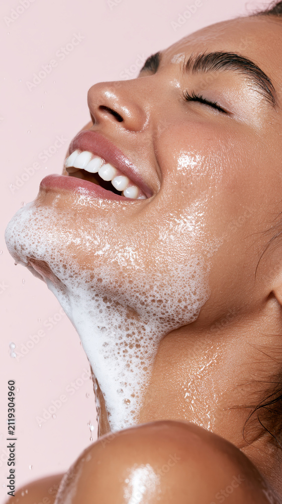 Fototapeta premium Young woman enjoying a refreshing facial cleansing ritual, experiencing clear and healthy skin with gentle foaming soap, promoting beautiful dermatology and wellness concepts
