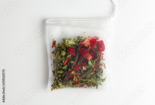 Herbal Tea Bag With Dried Rose Petals and Green Botanicals in White Mesh Sachet