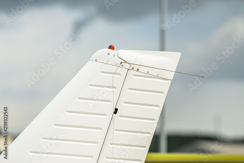 Foto Small aircraft tail fin and rudder close up at airshow.
