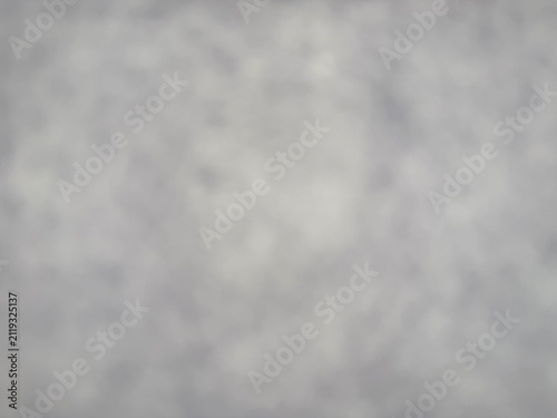 Obraz na plátne Abstract soft bokeh background with white and grey light spots