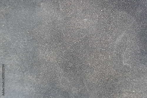Fotografie Dark gray suede leather texture with fine velvety material and soft matte finish