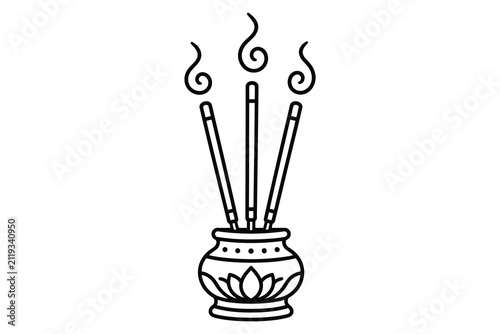 Three lit incense sticks in a decorative holder