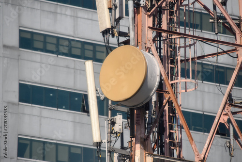 фотографія Microwave dish of a telecommunications tower