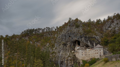 Predjama Castle (Predjamski grad), Renaissance fort built for defense under a natural rock arch high in the mountain stone wall. Postojna-Slovenia-198