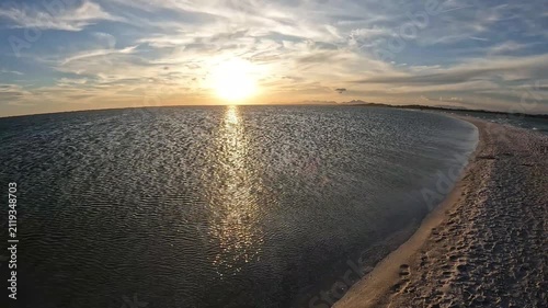 POV Walking Along a Sandy Sandbar at Sunset in Arubinha, Arraial do Cabo, Brazil
