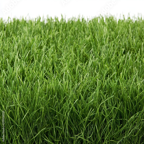 Fake green grass sits against white backgrounds for garden decor.