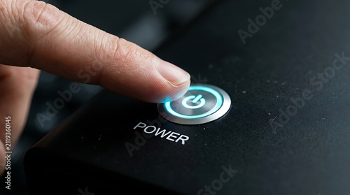 Finger pressing power button on modern device