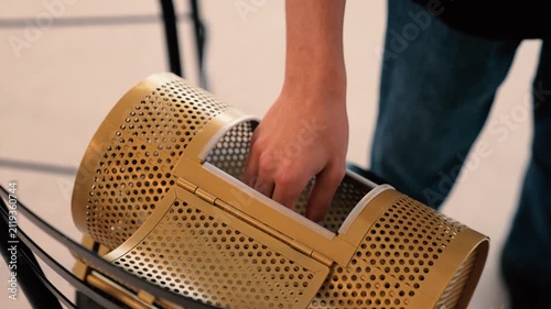 Hand going in to a raffle drum