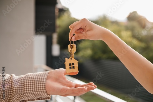 Handing over house keys, real estate transaction