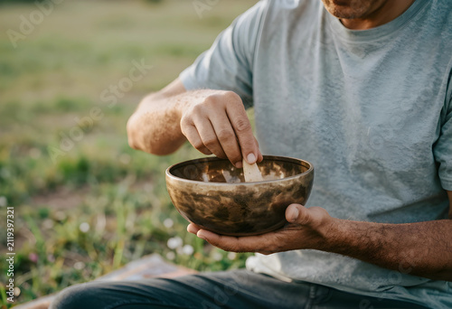Man playing a tibetan singi...