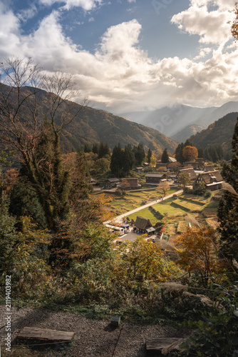 Stunning panoramic view of Gokayama, a historic mountain village in Toyama Prefecture, Japan, known for its traditional Gassho-zukuri farmhouses and UNESCO World Heritage status.