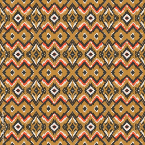 Seamless ethnic ikat pattern with bold gold, charcoal grey, and orange geometric diamond motifs on an ivory accent. Tribal fabric design perfect for bohemian prints, wallpaper, and creative decor.