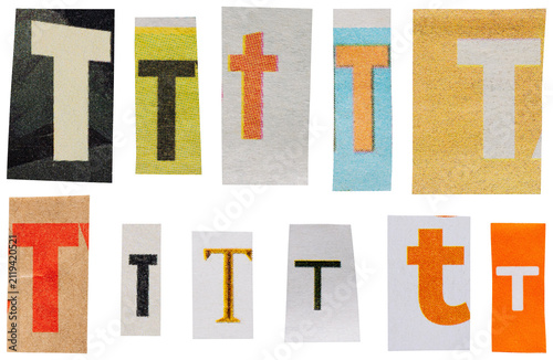 Set of orange newspaper and magazine cutout letters T for ransom note design