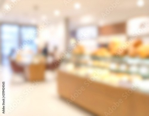 Blurred bakery interior providing soft bokeh background