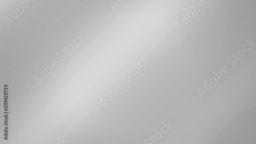 Brushed metal surface with a sweeping light reflection