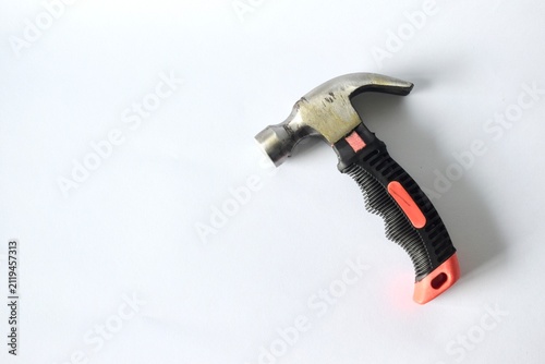 Принти на полотні High angle view of a small stubby claw hammer with an ergonomic black and orange rubberized grip handle isolated on a seamless white background