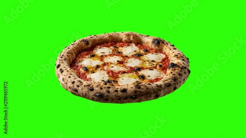 A traditional Neapolitan Margherita pizza with mozzarella and tomato sauce rests on a green screen backdrop. Ideal for restaurant commercials, food editing assets, and culinary promotions.