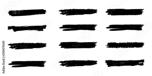 Set of hand drawn black brush stroke lines and marker scribbles on white background