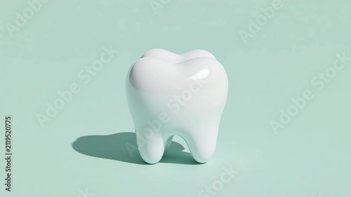 3D white tooth gently bouncing up and down in pastel mint studio background