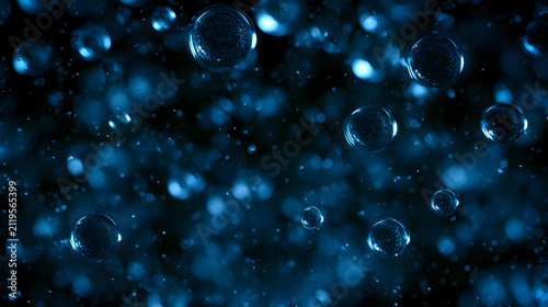 Glowing blue bokeh circles floating on dark black background